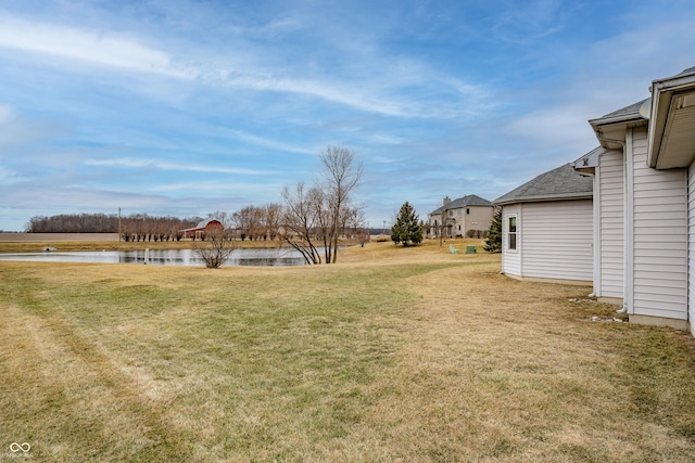 view of yard with a water view