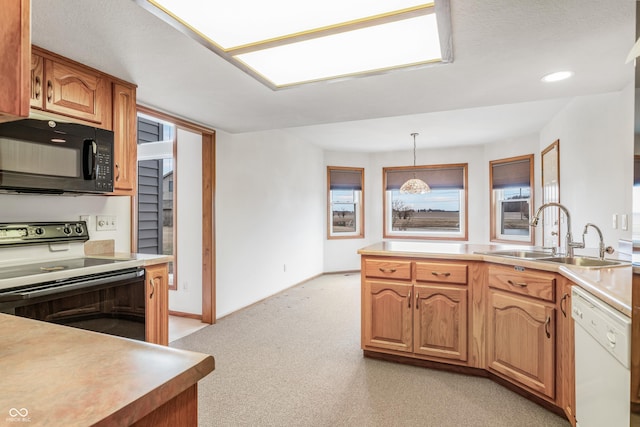 kitchen with light carpet, electric range, white dishwasher, black microwave, and a sink