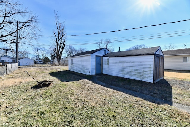 garage with a yard