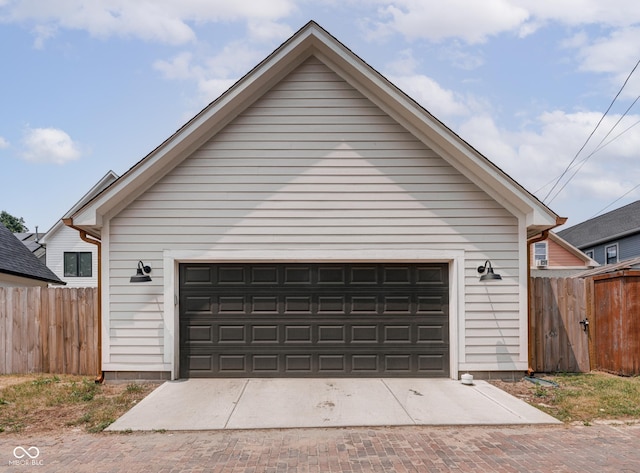 detached garage with fence