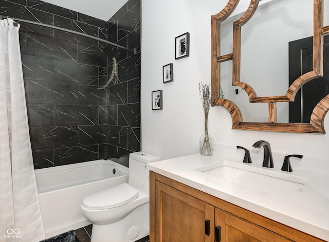 bathroom featuring toilet, shower / tub combo with curtain, and vanity