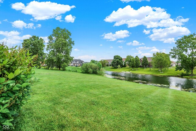 1393 N Salem Ct, Greenfield, IN 46140 - view of green lawn with a water view