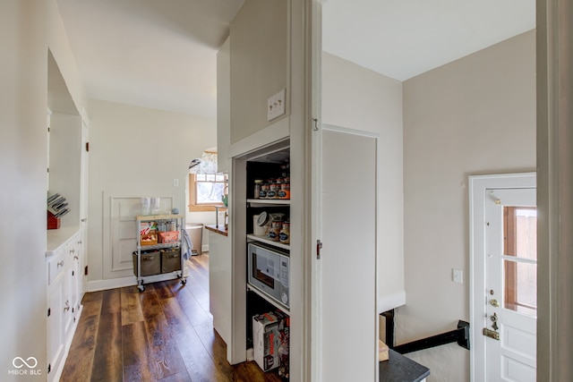 hall featuring dark hardwood / wood-style flooring