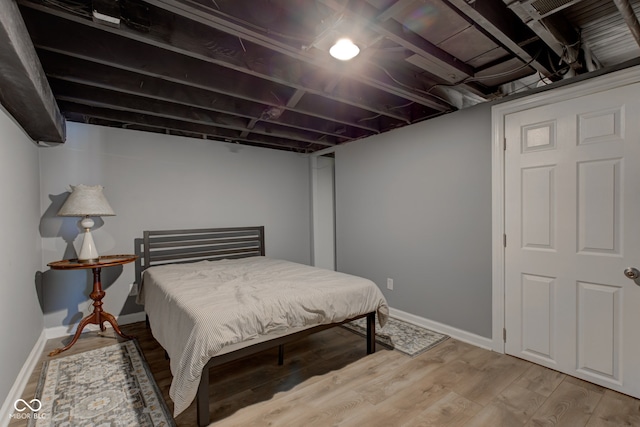 bedroom with light hardwood / wood-style floors