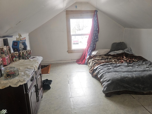 bedroom with vaulted ceiling