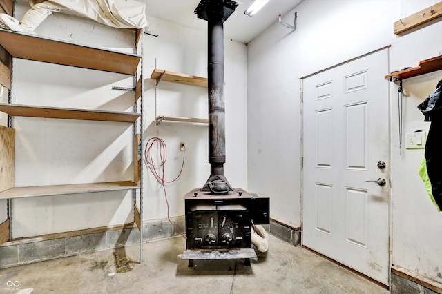800 N 400 W, Bargersville, IN 46106 - detailed view of a wood stove and unfinished concrete flooring