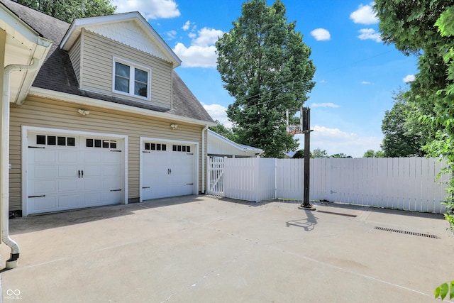 800 N 400 W, Bargersville, IN 46106 - view of side of home featuring roof with shingles, a garage, and driveway