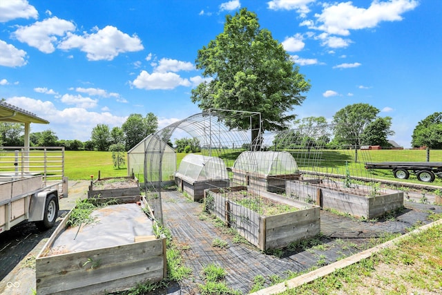 800 N 400 W, Bargersville, IN 46106 - deck with a vegetable garden, a greenhouse, a lawn, and an outdoor structure