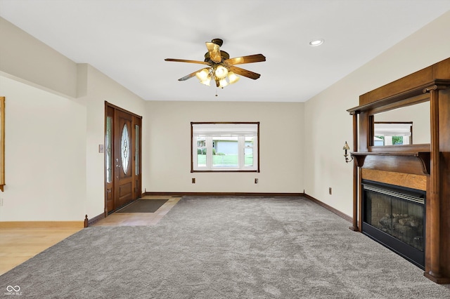 800 N 400 W, Bargersville, IN 46106 - unfurnished living room featuring a ceiling fan, carpet, a fireplace, and recessed lighting
