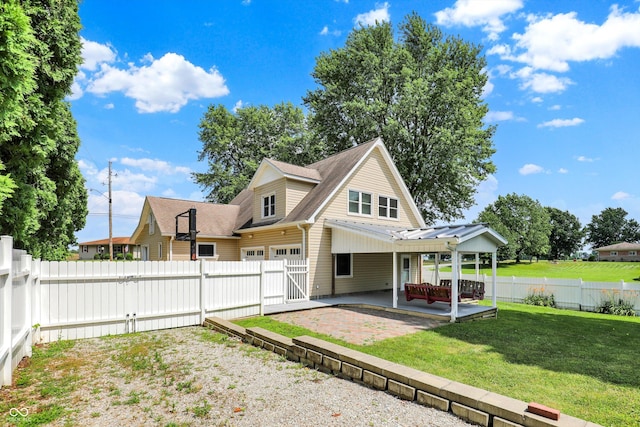 800 N 400 W, Bargersville, IN 46106 - rear view of house with a patio area, a fenced backyard, a gate, a garage, and a shingled roof