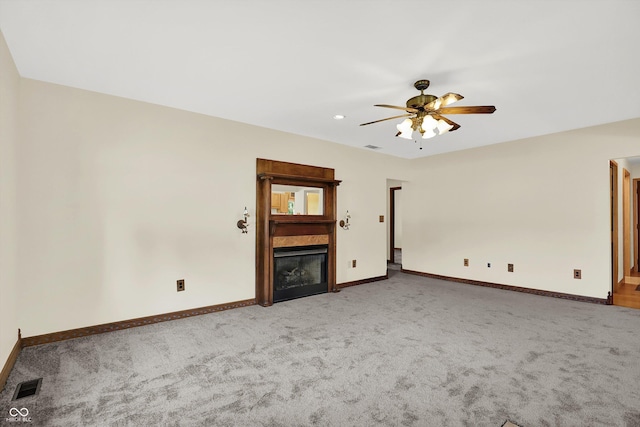 800 N 400 W, Bargersville, IN 46106 - unfurnished living room featuring carpet floors, ceiling fan, a fireplace, and recessed lighting