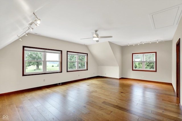800 N 400 W, Bargersville, IN 46106 - additional living space featuring attic access, healthy amount of natural light, ceiling fan, light wood finished floors, and lofted ceiling