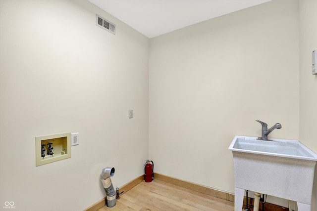800 N 400 W, Bargersville, IN 46106 - laundry area with light wood finished floors and hookup for a washing machine