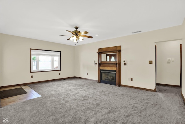 800 N 400 W, Bargersville, IN 46106 - unfurnished living room with a fireplace, ceiling fan, carpet flooring, tile patterned flooring, and recessed lighting