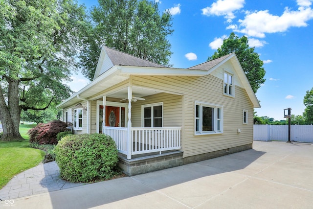 800 N 400 W, Bargersville, IN 46106 - view of front of house with covered porch, ceiling fan, a shingled roof, and crawl space