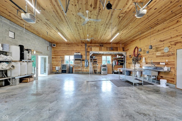 800 N 400 W, Bargersville, IN 46106 - miscellaneous room featuring concrete flooring, a workshop area, wooden ceiling, and wood walls