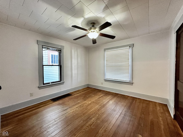 unfurnished room featuring ceiling fan and wood-type flooring