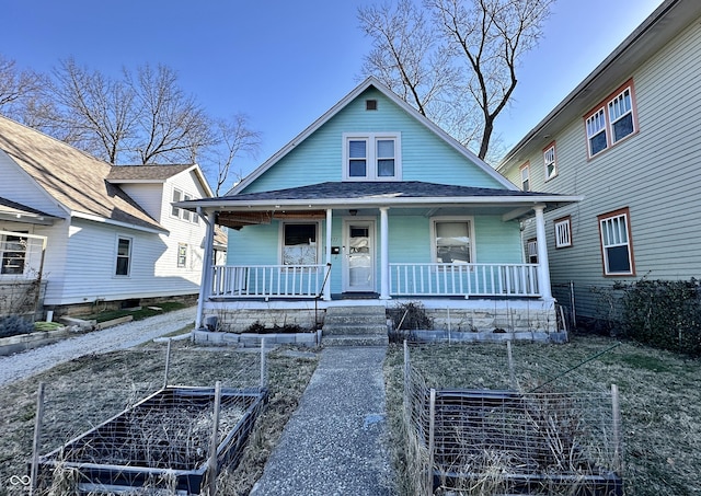 bungalow-style home featuring covered porch