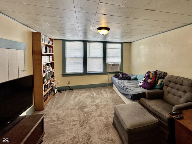 sitting room with carpet and cooling unit