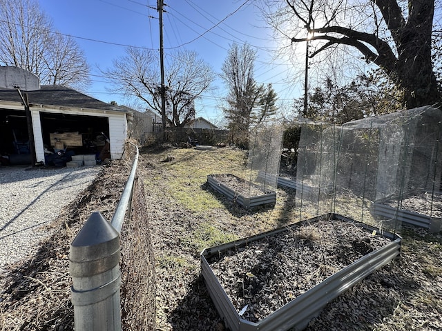 view of yard featuring a garage