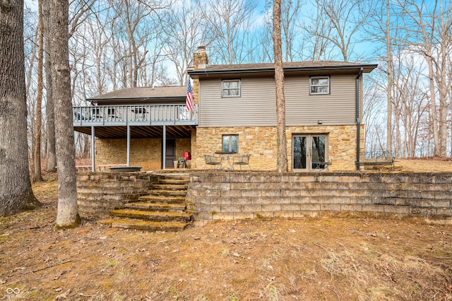 rear view of property with a deck