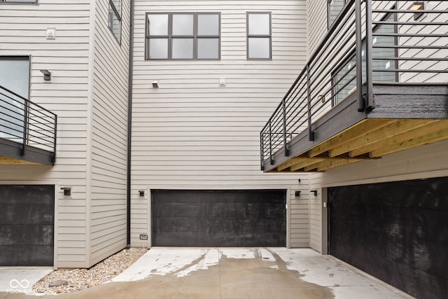 view of property exterior with a garage