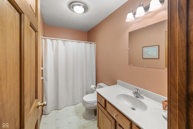 full bath with tile patterned floors, vanity, toilet, and a shower with curtain