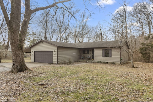 view of front of property featuring a garage and driveway