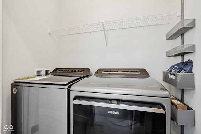 laundry area with laundry area and washing machine and dryer