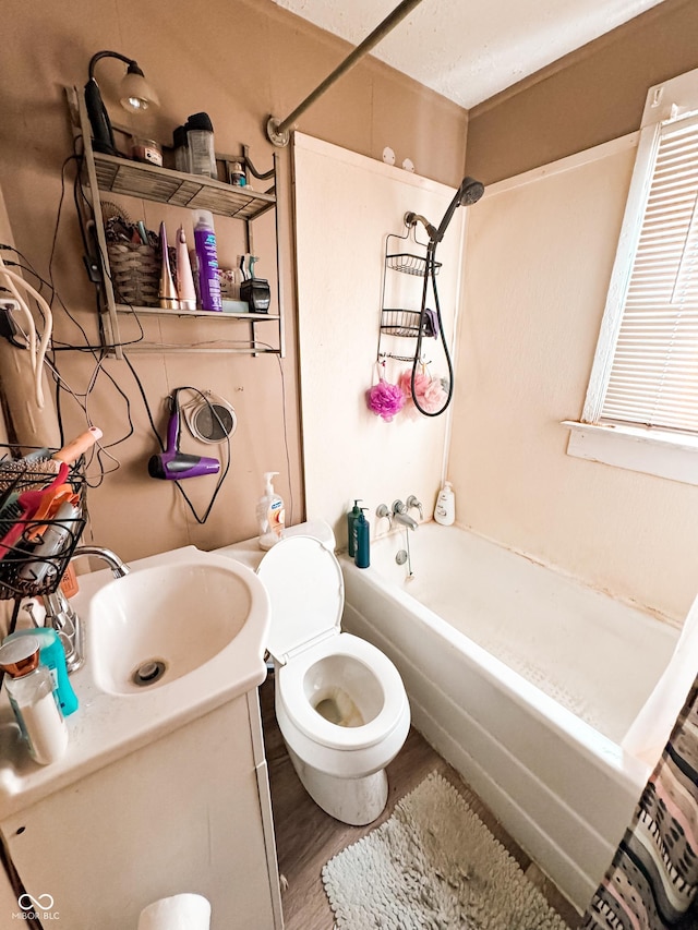 full bathroom featuring shower / bath combination with curtain, wood-type flooring, toilet, and vanity