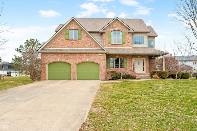 685 Greystone Ct, Columbus, IN 47201 - view of front of property with roof with shingles, an attached garage, brick siding, concrete driveway, and a front lawn