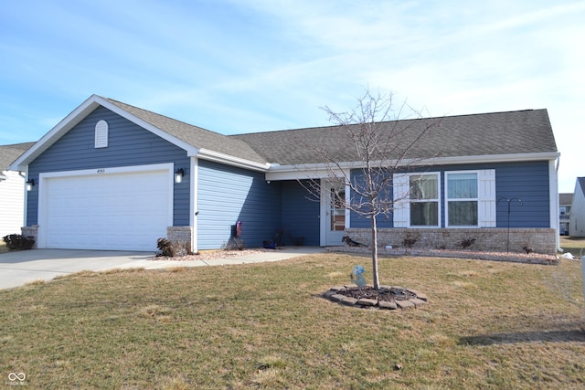 ranch-style home featuring a garage and a front yard