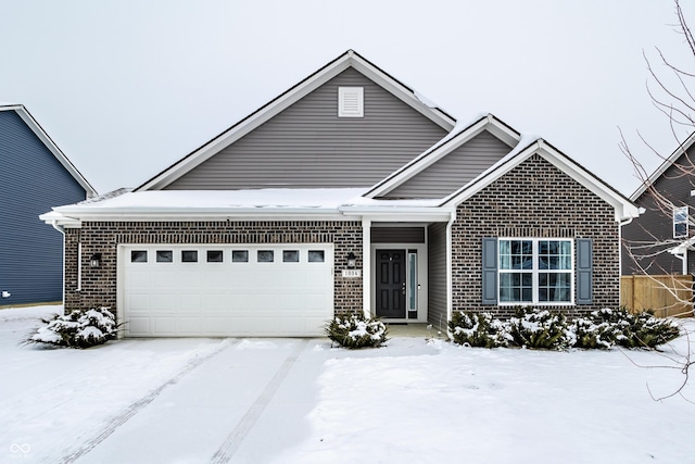 view of front of property featuring a garage