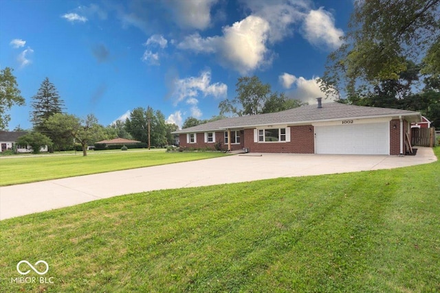 ranch-style home with a garage and a front lawn