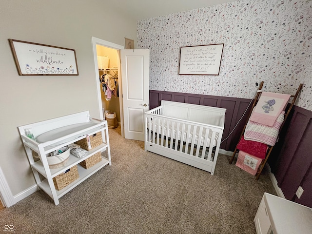 carpeted bedroom featuring a spacious closet