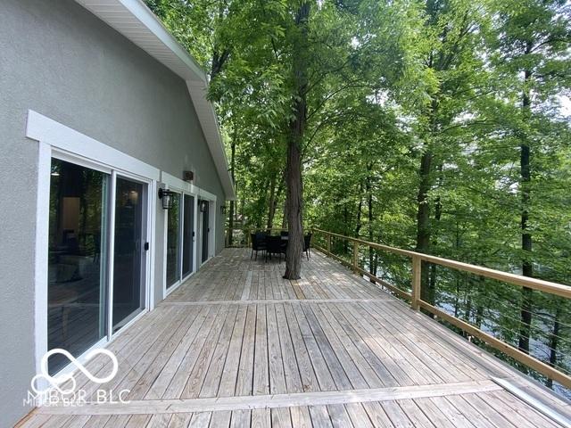 wooden deck with outdoor dining area