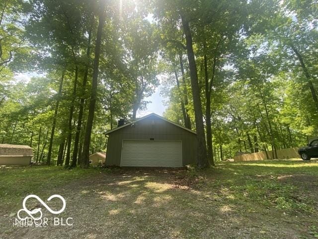 detached garage with fence