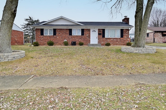 single story home with a front yard