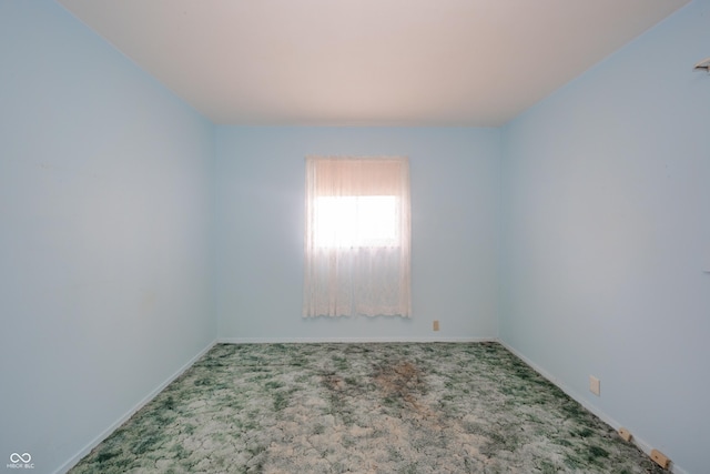 unfurnished room with carpet