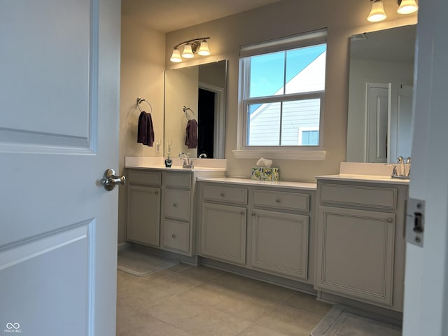 bathroom featuring vanity and tile patterned flooring