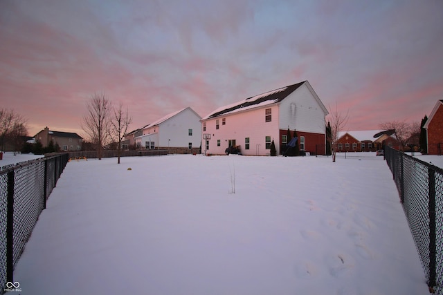 view of yard covered in snow