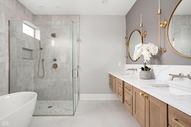 bathroom with vanity, tile patterned floors, and separate shower and tub