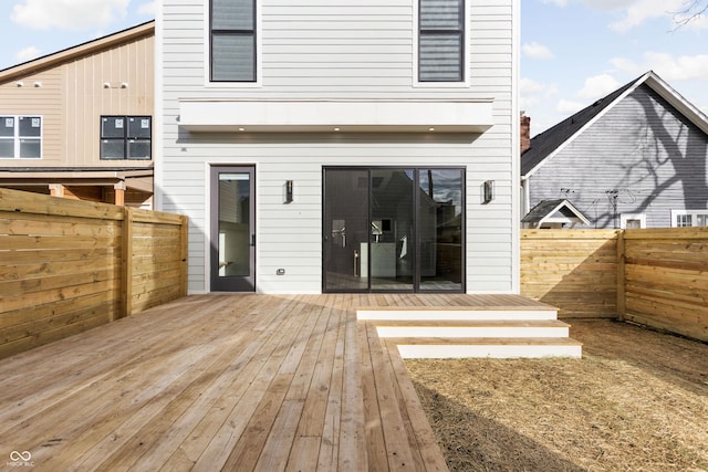 rear view of house with a deck