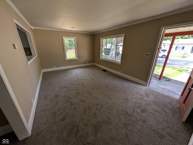 603 W 33rd St, Anderson, IN 46013 - carpeted empty room featuring healthy amount of natural light and ornamental molding