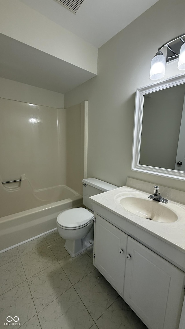 full bathroom featuring vanity, shower / washtub combination, and toilet