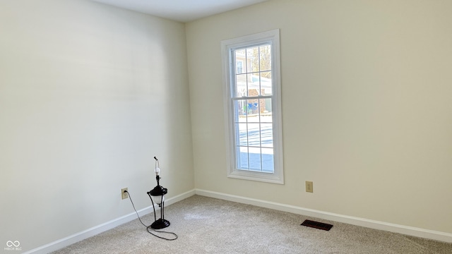 view of carpeted spare room