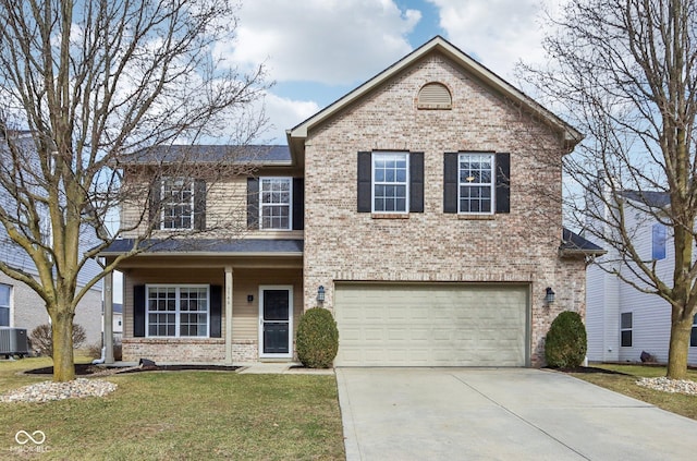 traditional home featuring a front yard, driveway, a garage, central air condition unit, and brick siding