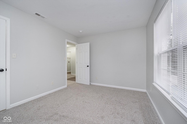 unfurnished bedroom with carpet flooring