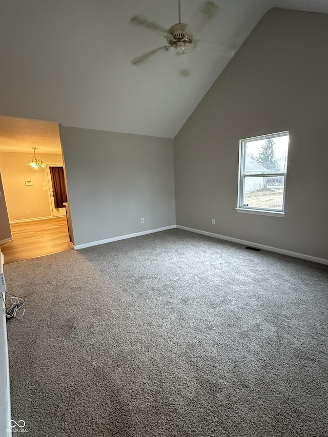 bonus room featuring lofted ceiling, ceiling fan, and carpet