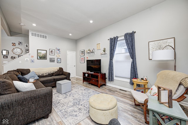 living room with hardwood / wood-style floors